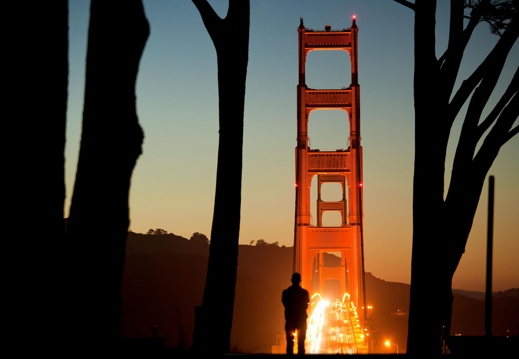 A man watching the sunset at the Golden Gate Overlook. Photo by Scott Sawyer.