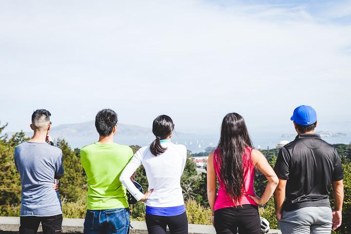 Five park visitors enjoy the view at Inspiration Point Overlook in the Presidio.