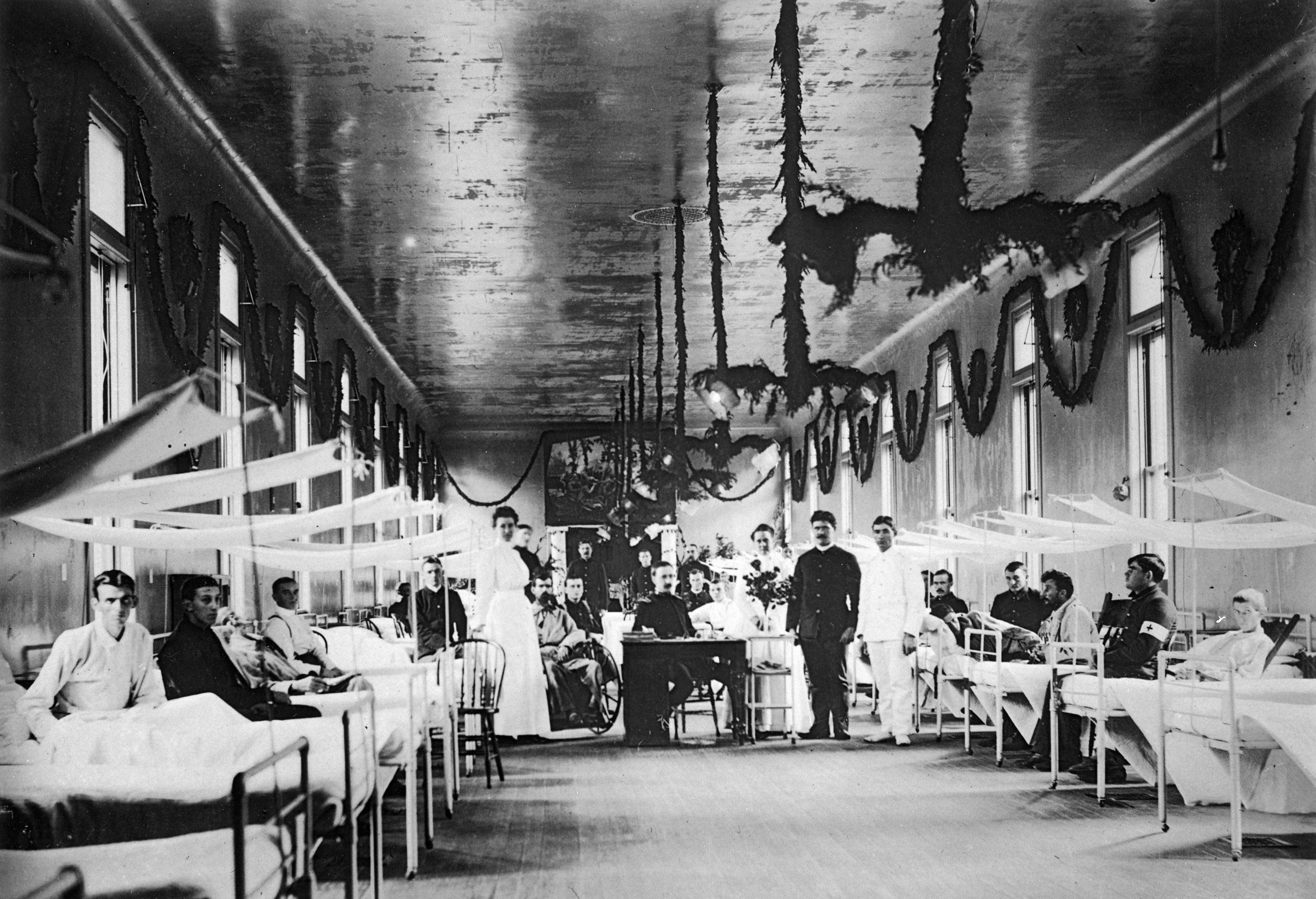 Nurses, hospital corpsmen, and patients in Letterman General Hospital