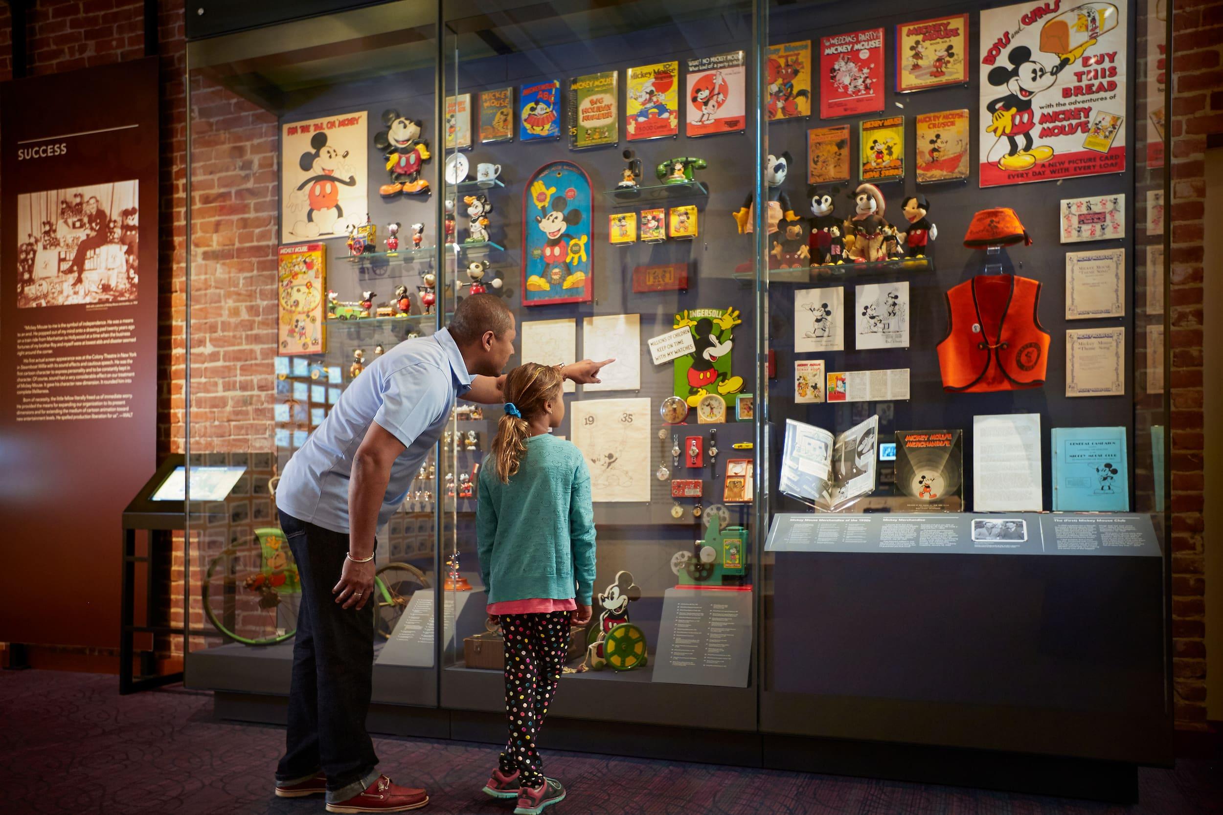 Man and young girl at The Walt Disney Family Museum. Photo courtesy of the museum.